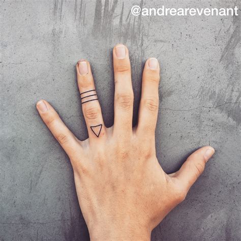Simple Lines And Triangle Finger Tattoos By Andrea