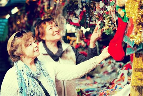 Happy Mature Women Purchasing Christmas Decorations Stock Image Image Of Market Mature 76724509