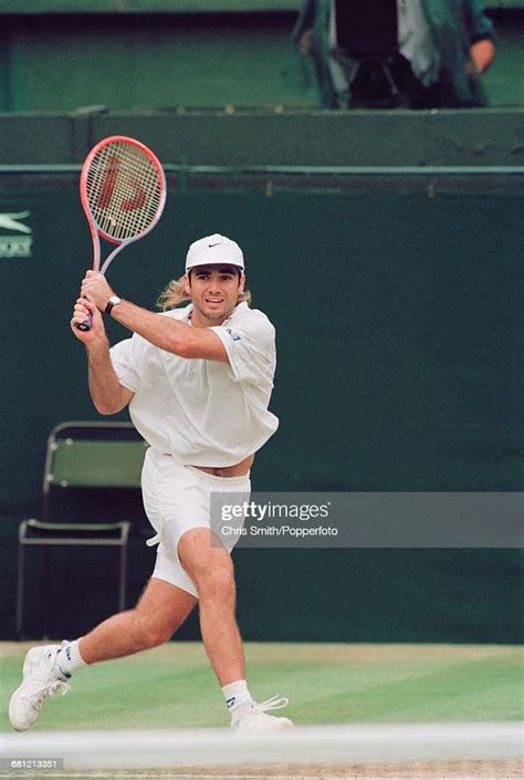 American Tennis Player Andre Agassi Pictured In Action To Win His