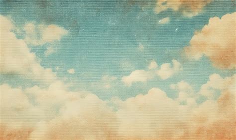 Premium Ai Image Retro Sky Pattern Vintage Blue And Yellow Clouds On