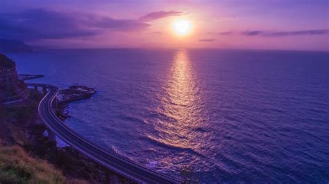 Download 1920x1080 Sunset Ocean Horizon Reflection Road Wallpapers