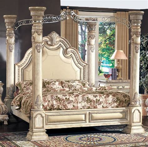 Most of the traditional canopy beds have a victorian aesthetic, with either metal rod frames or intricately carved wood frames and posts. Victorian Inspired Antique White Luxury California King ...