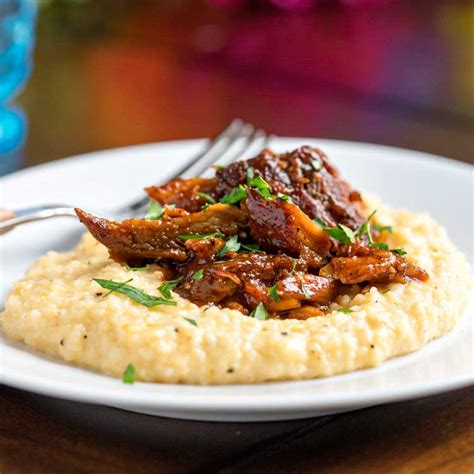 4 recipes that transform your pork tenderloin leftovers. BBQ Pork with Cheesy Grits - keviniscooking.com