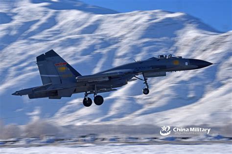J 11 Fighter Jets Fly Over Snow Capped Mountains China Military