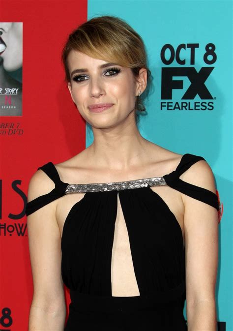 Emma Roberts Cleavy And Leggy Wearing Black Backless Dress At The