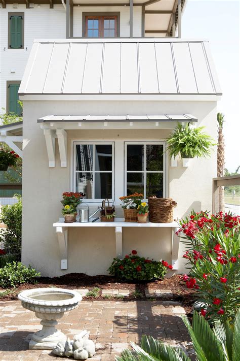 Awnings are supported by bamboo sticks with a fabric overhang. Historic Lowcountry Cottage With Modern Amenities ...