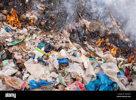 Burning Plastic Waste In The Indian Countryside Stock Photo Royalty