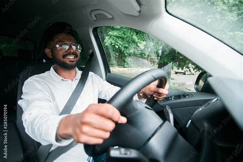 Indian Man Driving Car