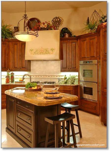Install additional cabinets to fill in the space. decorating the space above your kitchen cabinets | Above ...