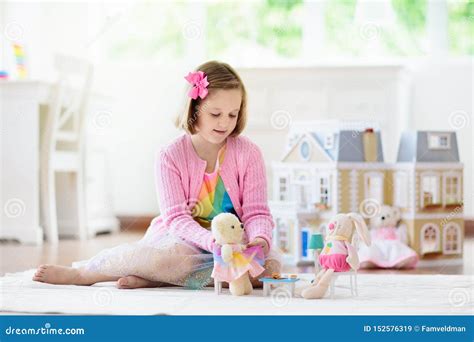 Little Girl Playing With Doll House Kid With Toys Stock Image Image