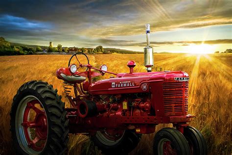 Red Tractor In Sunset Gold Photograph By Debra And Dave Vanderlaan