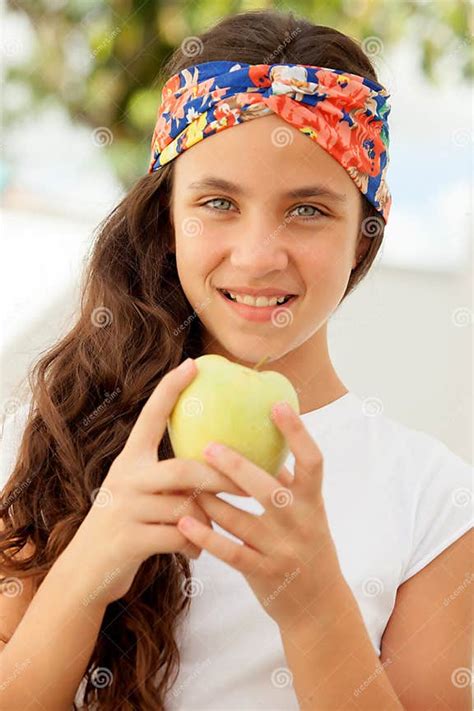 Teenager Girl Eating A Apple Stock Image Image Of Cheerful Beautiful 59878219