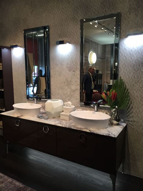 We have the vanity, it's the shutter double in brown with honed carrera marble on top from restoration hardware, it's 72 wide and its counter top is 34 tall in either of these two sizes: Double Sink Vanity Designs That Make Sharing Fun And Easy