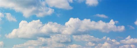 Sunlit White Clouds In The Blue Sky Stock Photo Image Of Cloudy