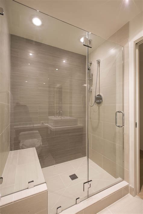 This Modern Bathroom Has A Large Glass Enclosed Shower In Tile The