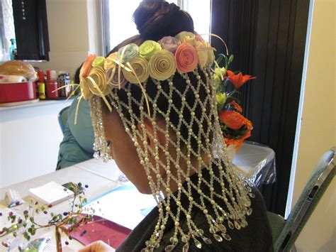 Working At Her Craft Project In The Headdress Headdress Hair Styles