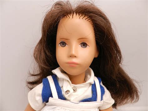 the brunette slate eyed sasha is thinning on the top of her head sasha doll brunette sashas