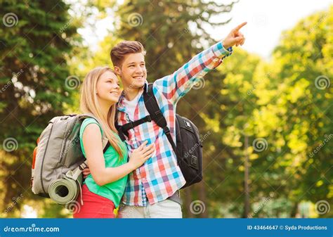 Smiling Couple With Backpacks In Nature Stock Image Image Of People