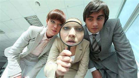 Group Of Business People Looking Through Magnifying Glass Stock Video Footage Dissolve