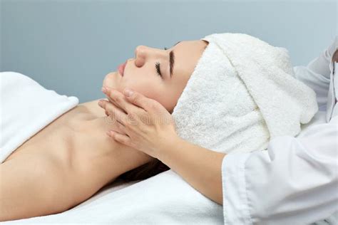 Young Beautiful Woman Receiving The Facial Massage Stock Image Image Of Massage Caucasian