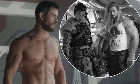 Chris Hemsworth Shows Off His Bulging Biceps On The Set Of Thor Love