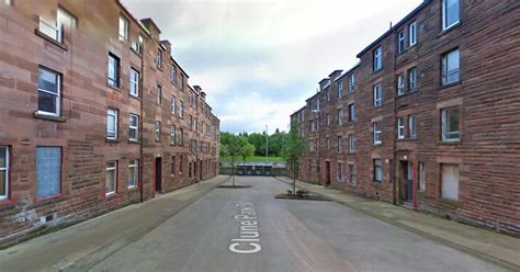 police investigate suspicious death at port glasgow flat after badly decomposed body is