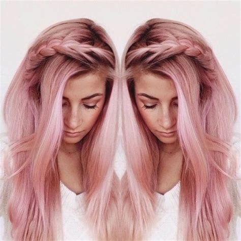 The rose gold hair is a reinvention of the ordinary blonde, which comes with golden reflections that highlight the features of the face, but also with feminine pink shades. 50 Rose Gold Hair Ideas | herinterest.com