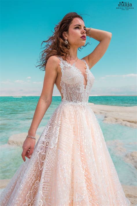 Couture designer wedding dresses are simple white gowns, but they have evolved in ways unimaginable over the centuries. Iris | Production of wedding dresses, bridal gowns. Wholesale