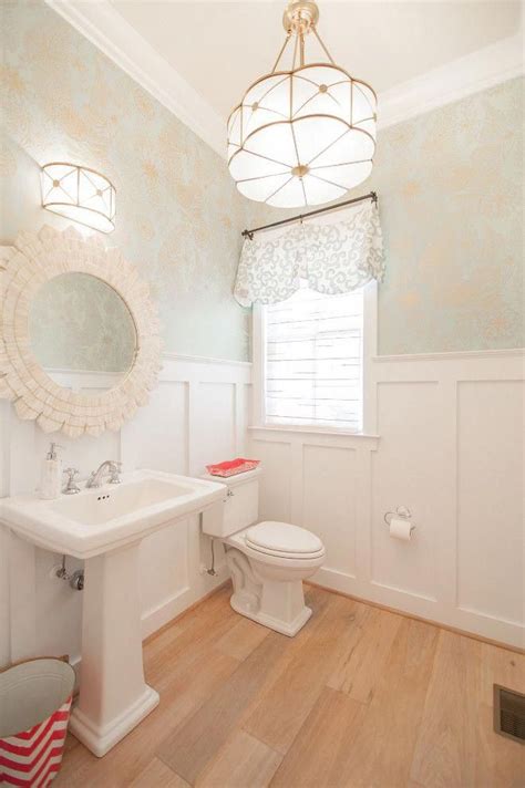 Powder Room Features Board And Batten Wainscoting And Wallpaper The