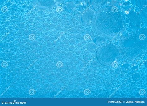Soap Foam In Blue Close Up Foam Bubbles On The Surface Of Detergent Or