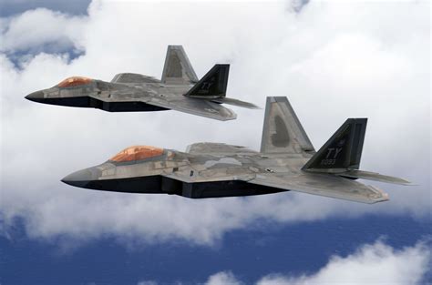 two f 22 raptors fly over joint base pearl harbor hickam hawaii defence forum and military