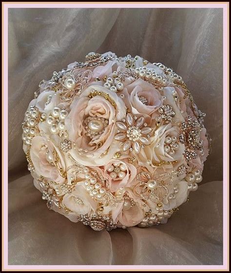 Vintage bridal brooch bouquets, brooch bouquets, & silk bouquets. Pink rose gold jeweled bouquet | Ivory, Jewel and Wedding