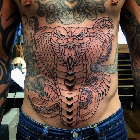 27 Stunning Stomach Tattoos For Men Tattooswin