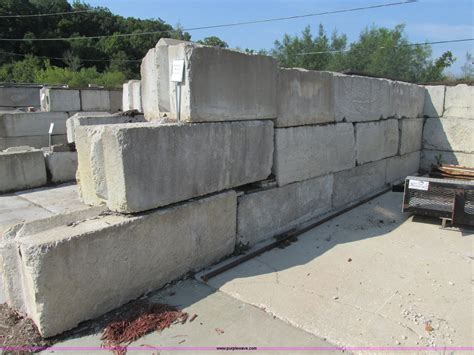 Cantilever walls are created of concrete. Approximately 25 concrete wall blocks in Warrenton, MO ...