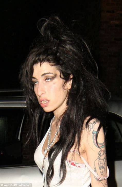 Wild Amy Winehouse Facing Arrest After Attack On Two Men While Out On