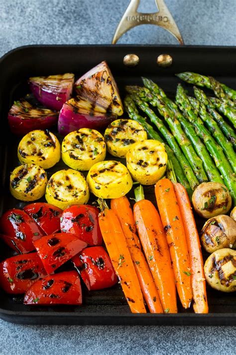 When i barbeque, i like to try and make the whole meal on the grill. These grilled vegetables are an assortment of colorful ...