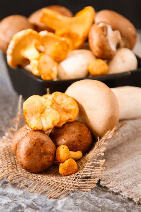 Fresh Whole White Mushrooms Or Agaricus In A Bowl On A Rustic Stock