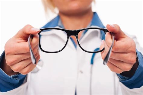 Free Photo Female Optometrist Giving New Glasses