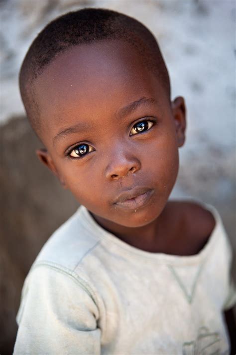A Young Boy With Bright Eyes Beautiful Children Face African Children