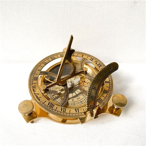 brass sundial and compass nautical decor navigation in 2022 nautical decor vintage nautical