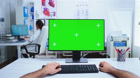 Pov Of Doctor Hand Working On Computer With Green Screen In Hospital