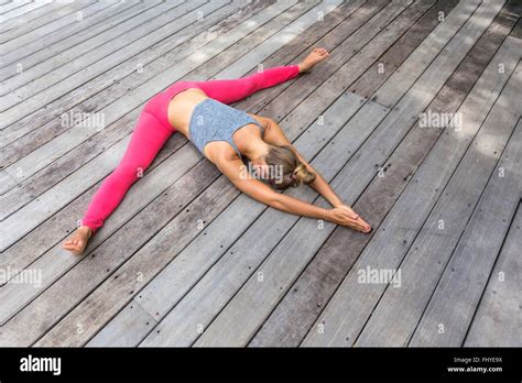 Woman In Yoga Straddle Position Hi Res Stock Photography And Images Alamy
