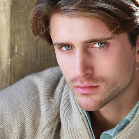 Portrait Of Young Attractive Man With Impressive Eyes Stock Photo By