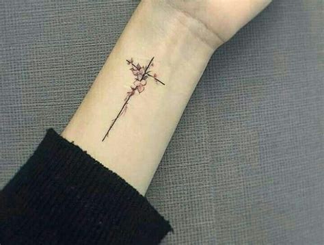 Womens Small Cross Tattoo On Wrist