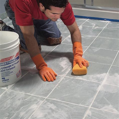 How To Lay Tile Install A Ceramic Tile Floor In The Bathroom The Family Handyman Ceramic