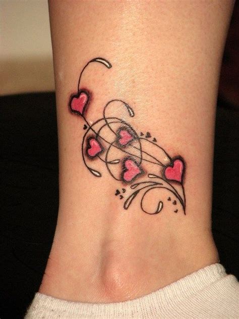 Playful and petite, these designs are an excellent choice for your first inking or. Hearts & Swirls on Ankle - Tattoo Picture at CheckoutMyInk ...