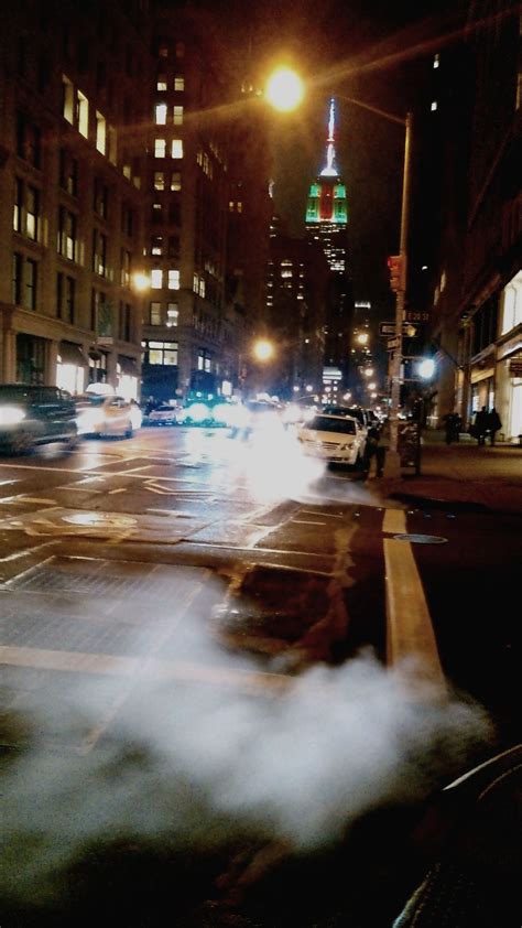 Smoke Flows From The Street In Front Of The Empire State Building
