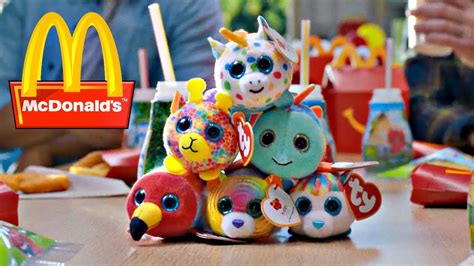 A small toy is included with the food, both of which are usually contained in a red cardboard box with a yellow smiley face and the mcdonald's logo. 2019 McDONALD'S TY TEENIE TEENY TYS HAPPY MEAL TOYS HAPPY ...