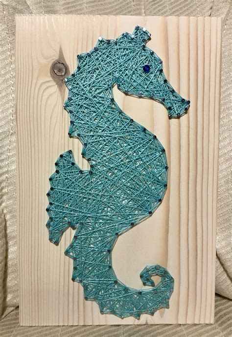 Wooden Seahorse Wall Decor It Seems That Theres No Interior Designer