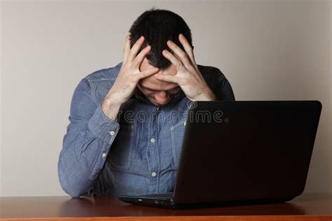 Depressed Programmer Feeling Weakened In The Office Stock Image Image